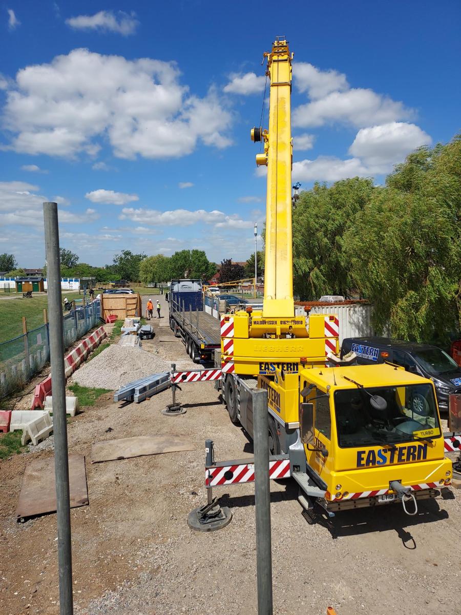 Crane unloading in compound
